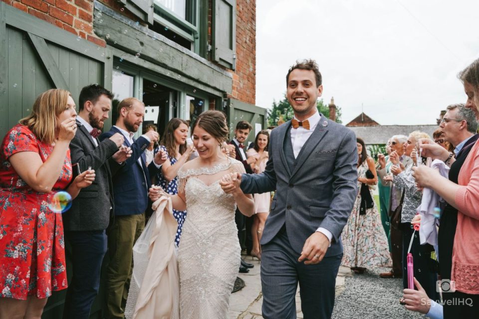 Such a beautiful couple and an amazing wedding dress! Photos were by SaywellHQ Wedding Photographer.
