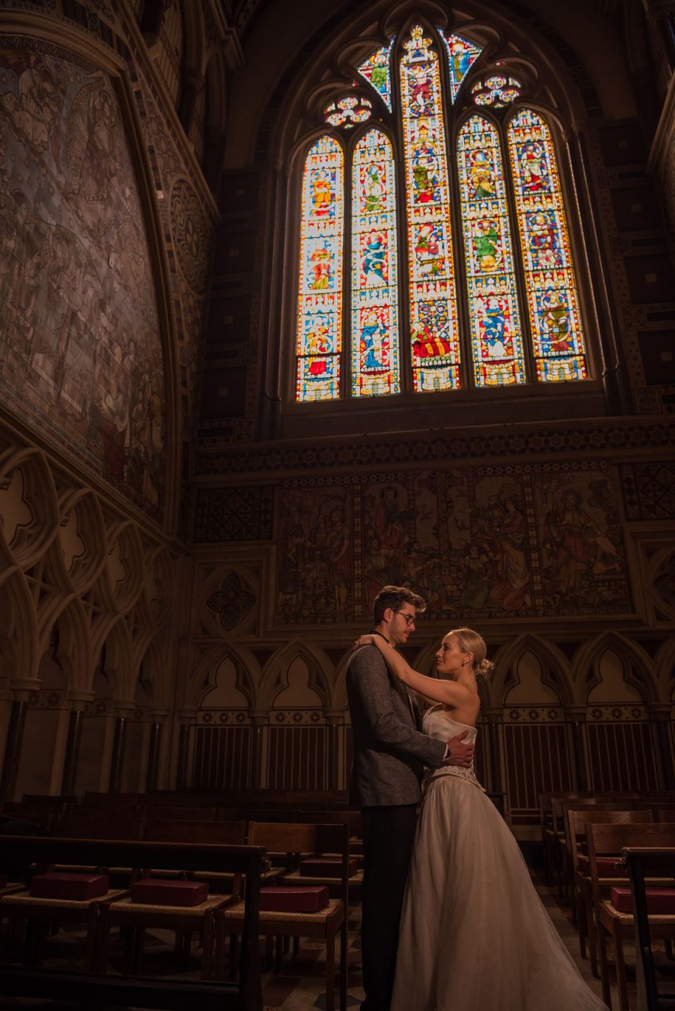 J Seymour Photography captured this beautiful stained glass window wedding picture perfectly! Click the photo to see more examples of her work or of the wedding pictured.