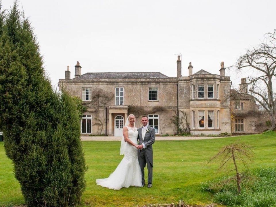 Laure and Dane outside Guyer House, their fantastic wedding venue.