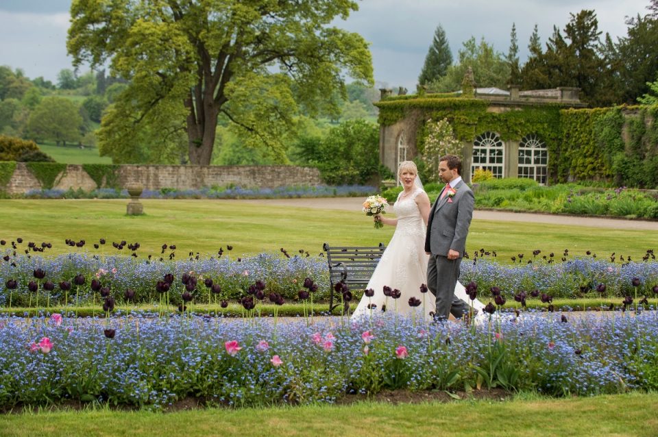 Walk the flowery aisles in the garden at this lovely venue.