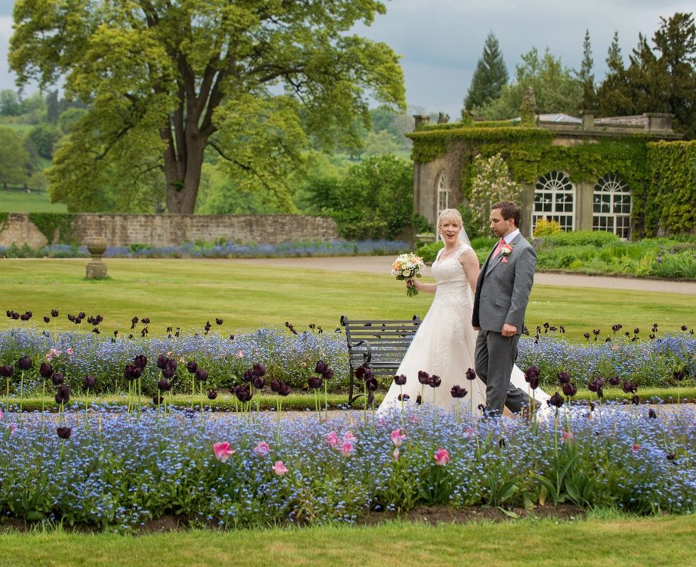 Walk the flowery aisles in the garden at this lovely venue.
