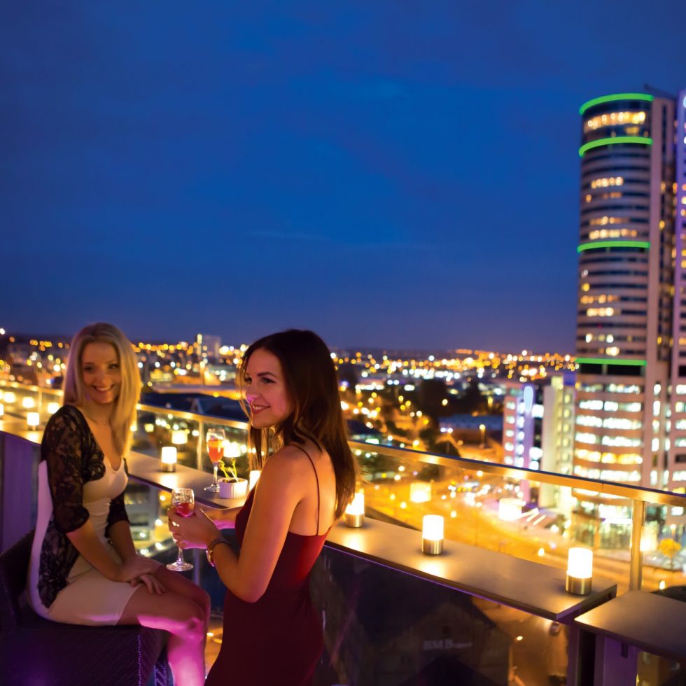 Drink to love on top of the beautiful city!