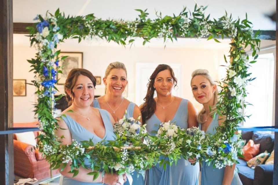 We love the flower frame and beautiful bridesmaids!