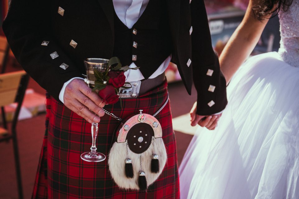 A kilt-sporting Scot with his wife!