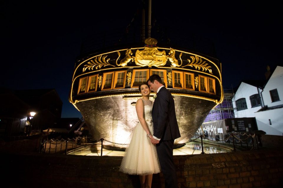 Have beautifully lit night time photos in front of the ship!