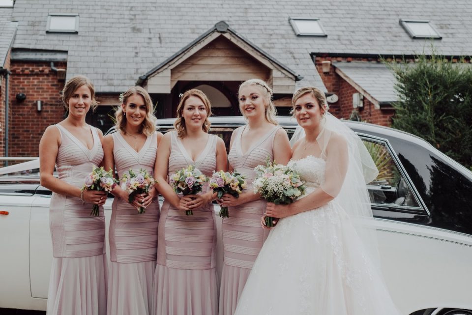 How unique are these bridesmaids dresses! And the bridal gown too is incredible.