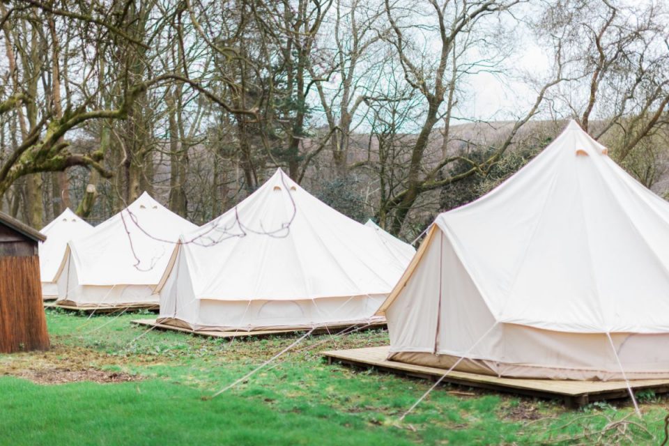 Rebecca and Chris married at Wyresdale Park Barn Weddings in Preston where guests can 'glamp!'
