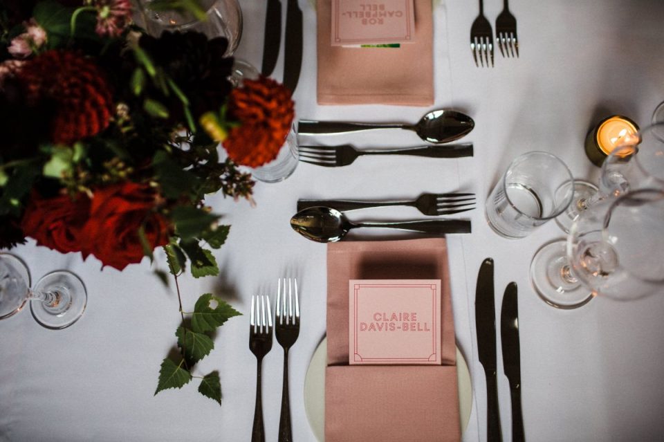 Such cute table settings! Love this wedding!