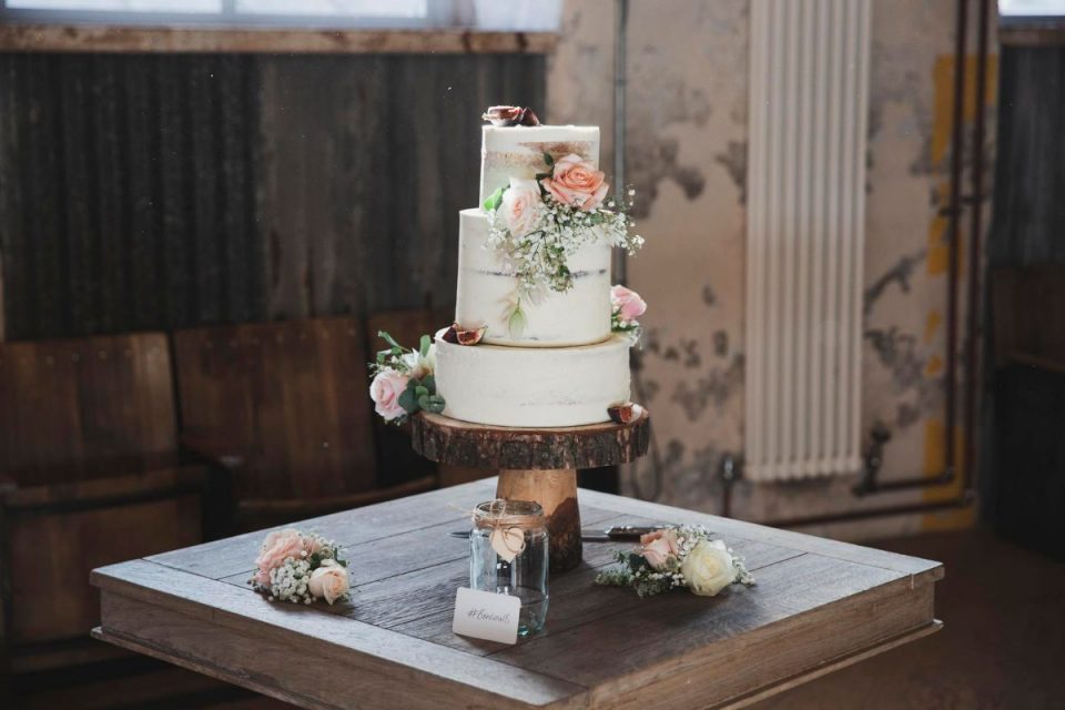Their beautiful cake and their wedding as a whole was rustic themed at Holmes Hill, Clitheroe.