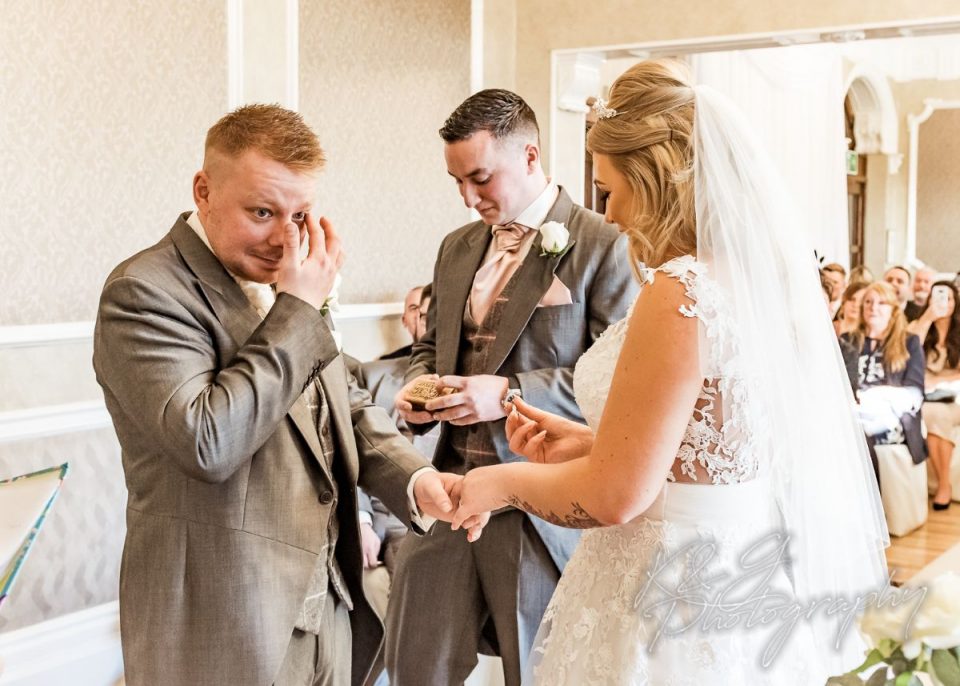 Aww! K&G Photography caught this lovely moment on camera.