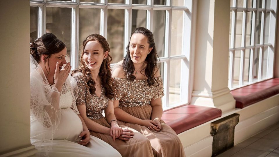 The glowing bride and her glittering bridesmaids.